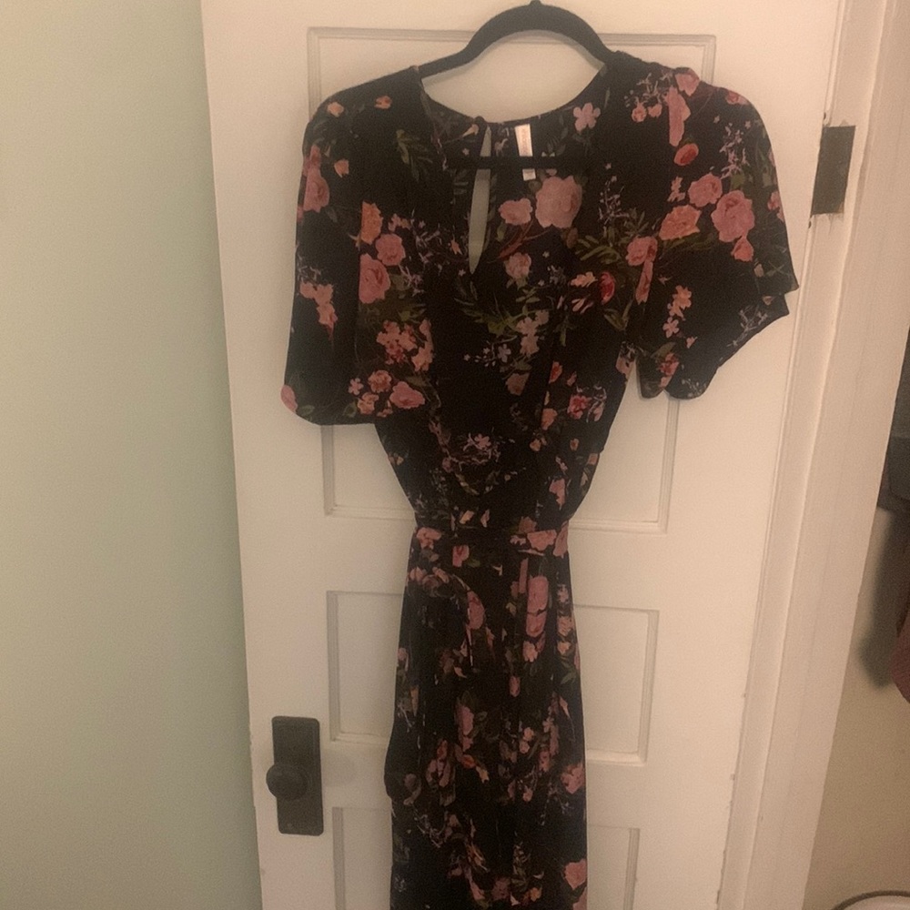 Floral jumpsuit, never worn. Light and airy